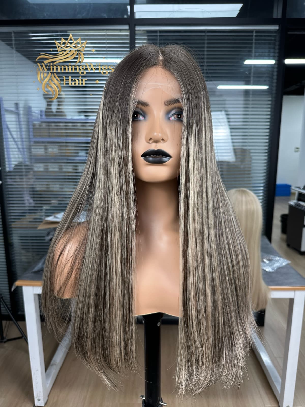 Custom ash blonde human hair wig showing the lace front in front view