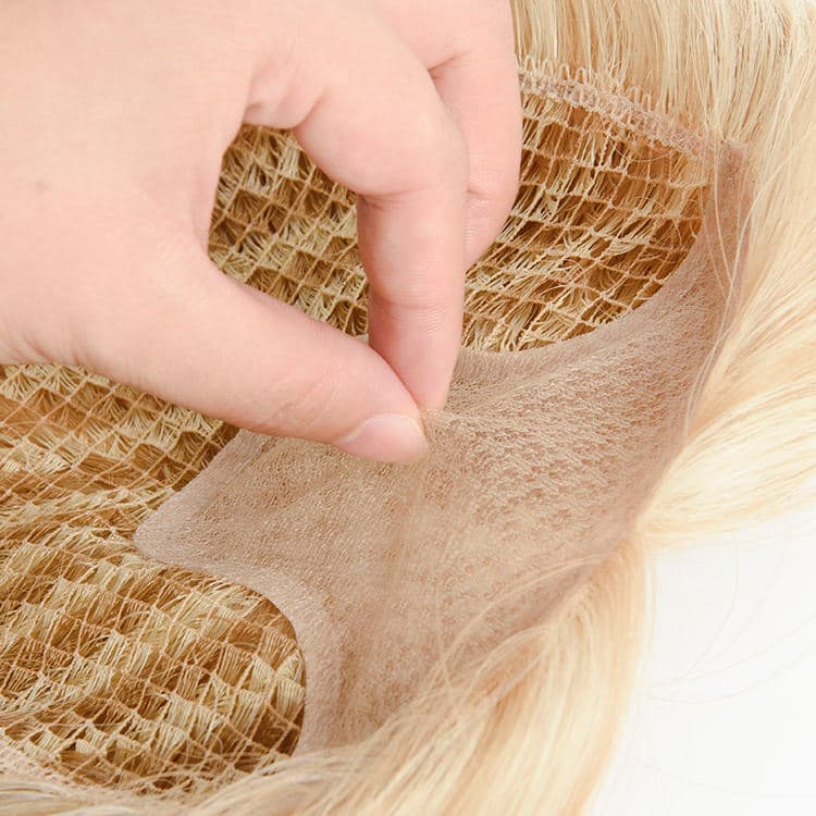 Blonde fishnet topper mesh base detail showing the lightweight open-weave construction