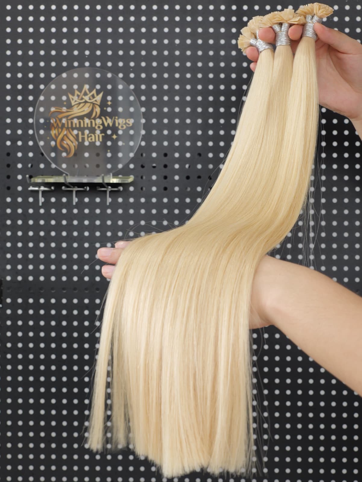 Long light blonde Flat Tip human hair extensions with flat keratin bonds