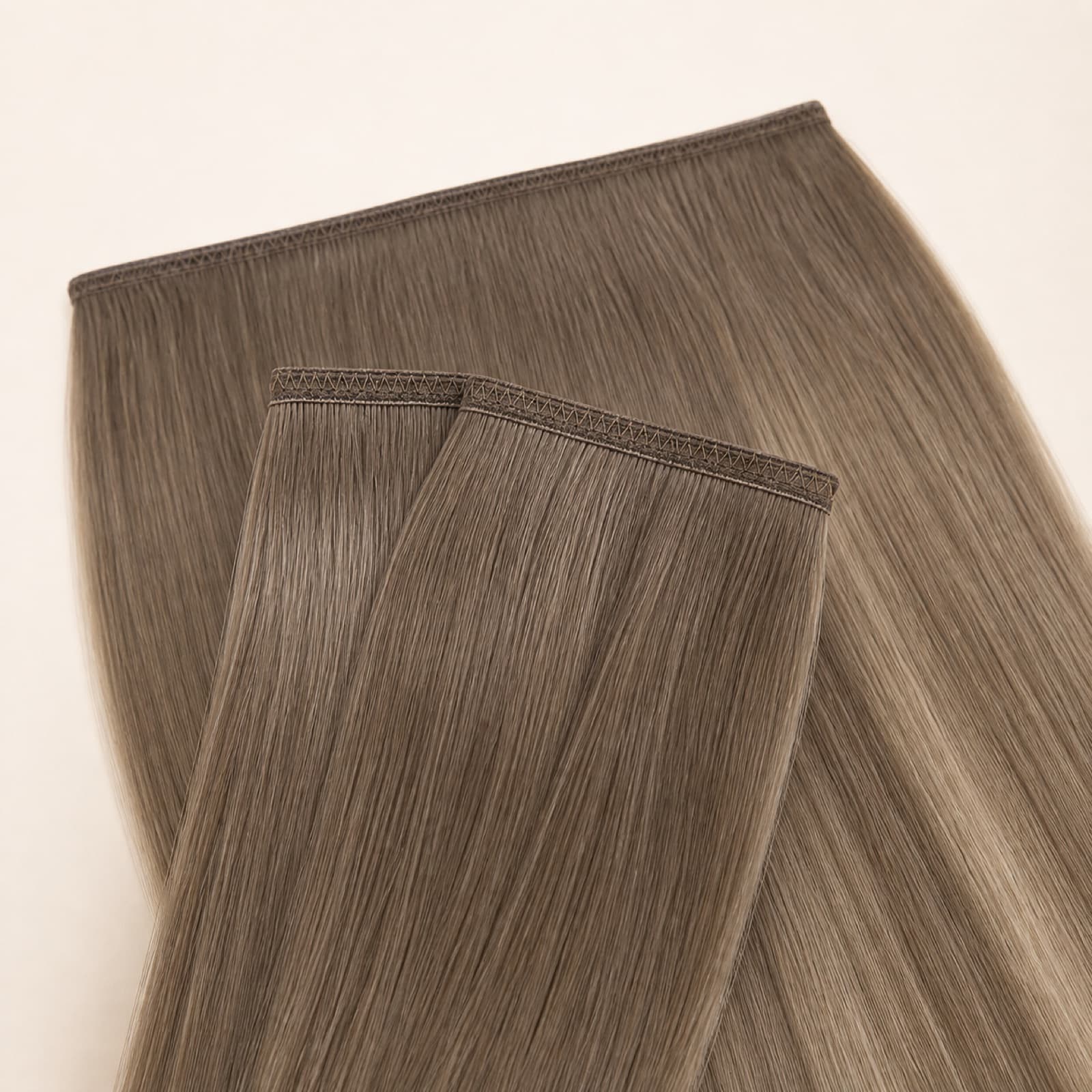 Ash brown Flat Weft human hair extension with slim stitched seam