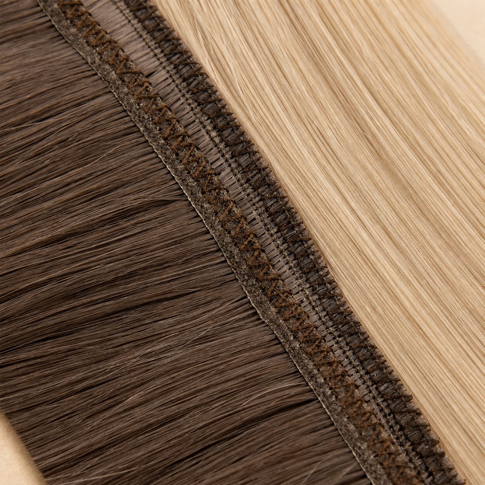 Reinforced Flat Weft seam detail in brown and blonde human hair