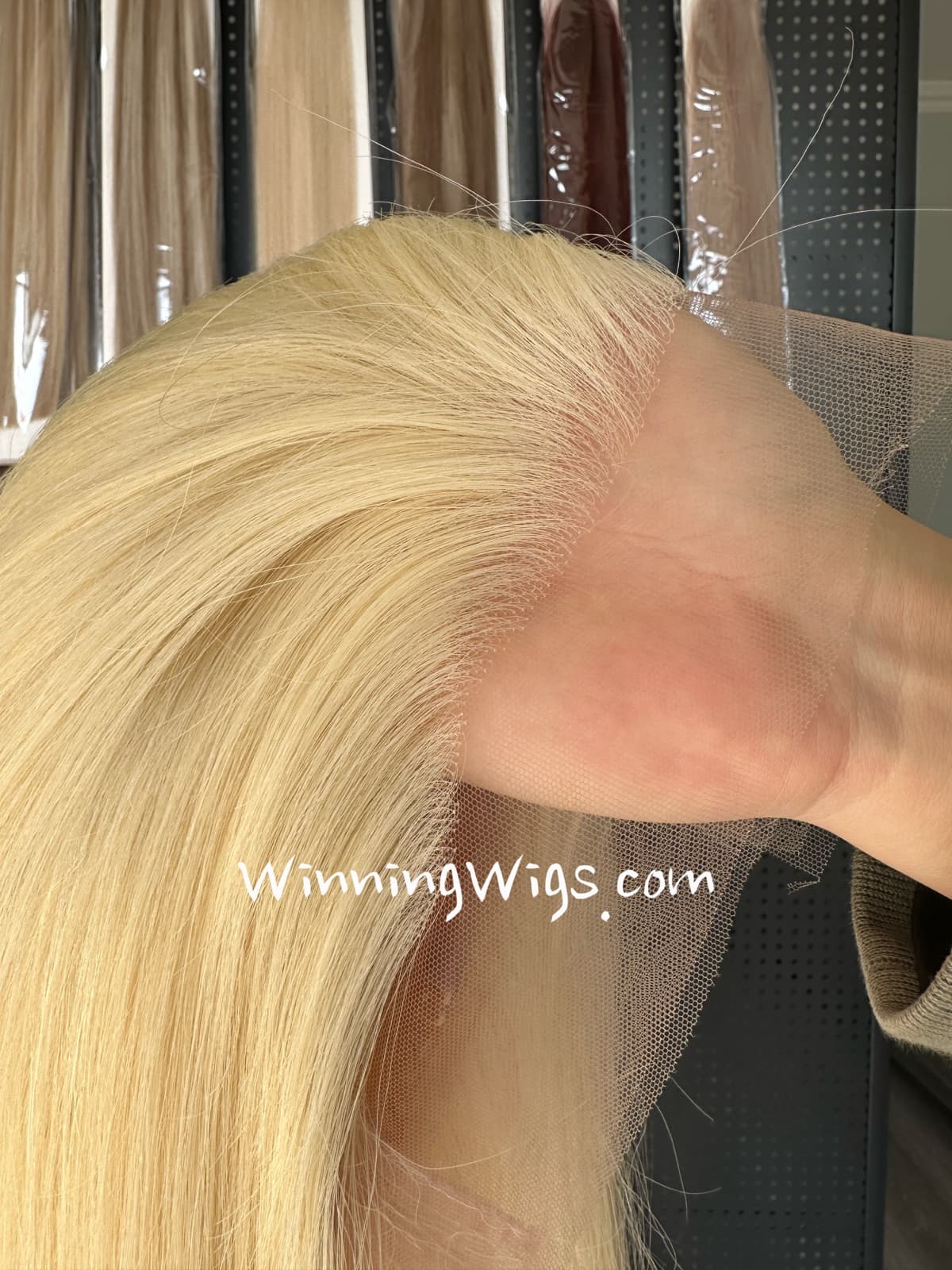 Close-up of a blonde full lace virgin human hair wig with a hand-tied lace hairline