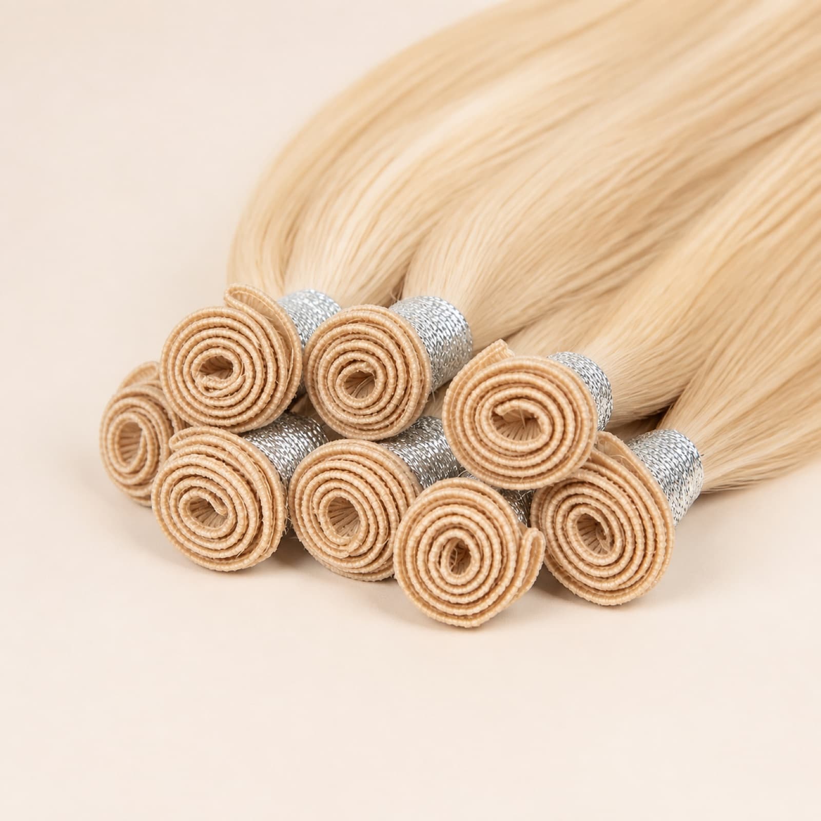 Light blonde Hand-Tied Weft virgin human hair extensions with delicate hand-tied construction