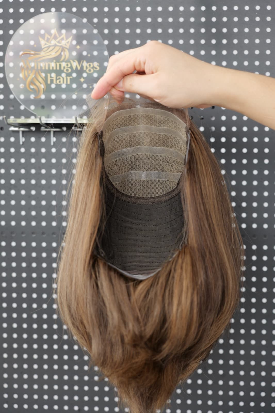 Medical human hair wig cap interior showing the lace front and stretch panel construction