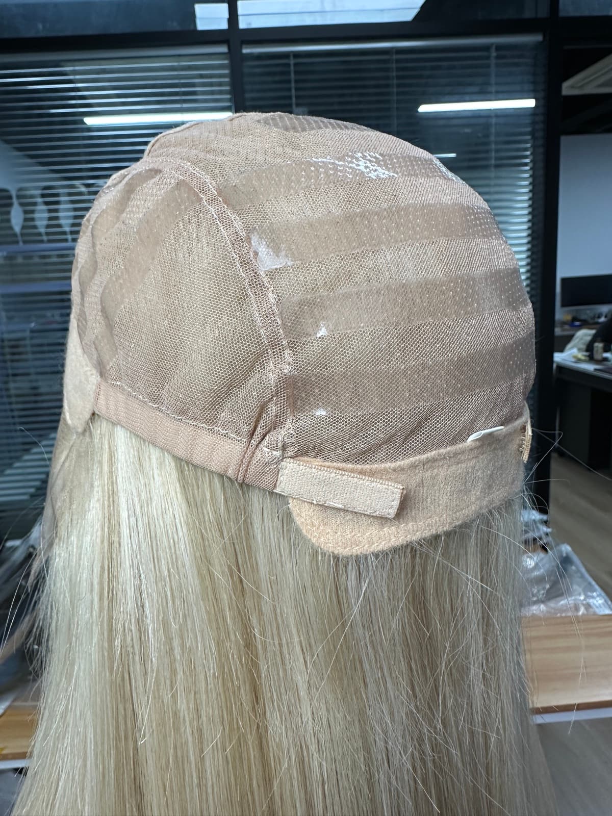 Medical human hair wig full lace cap showing adjustable back construction