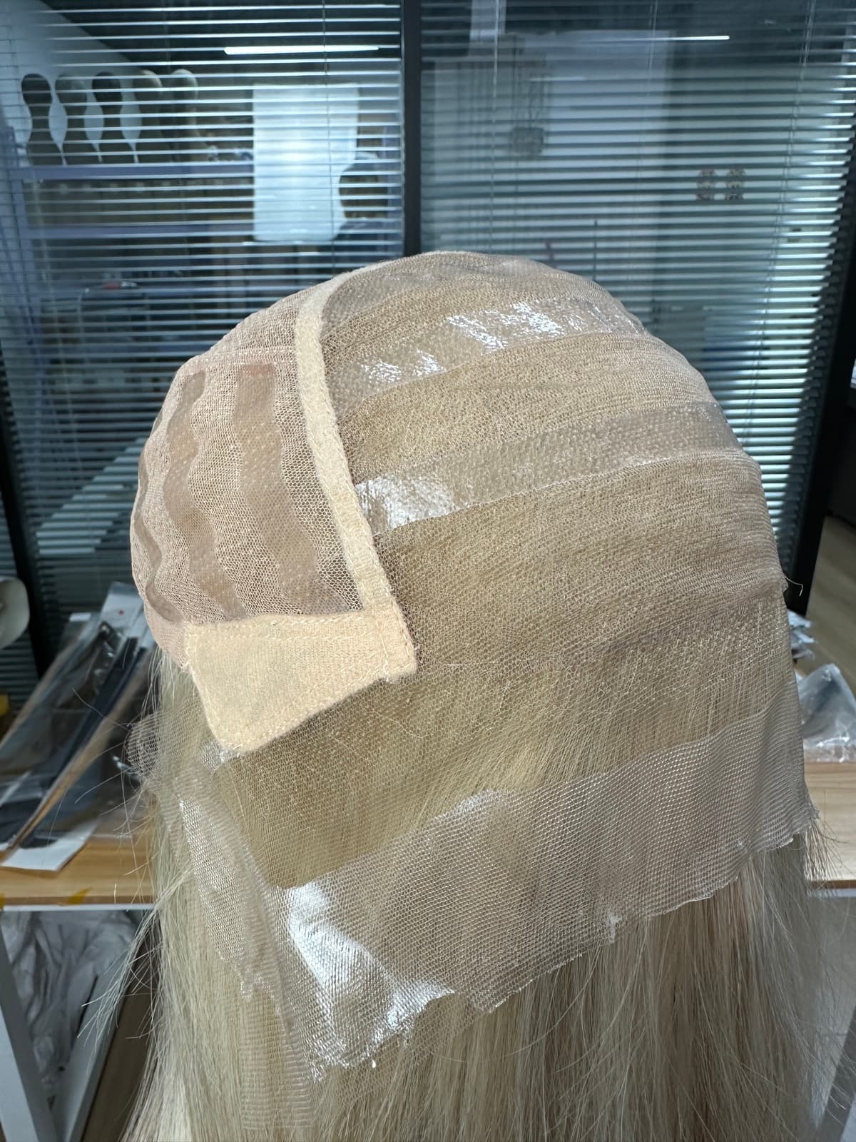 Medical human hair wig full lace cap showing front construction detail
