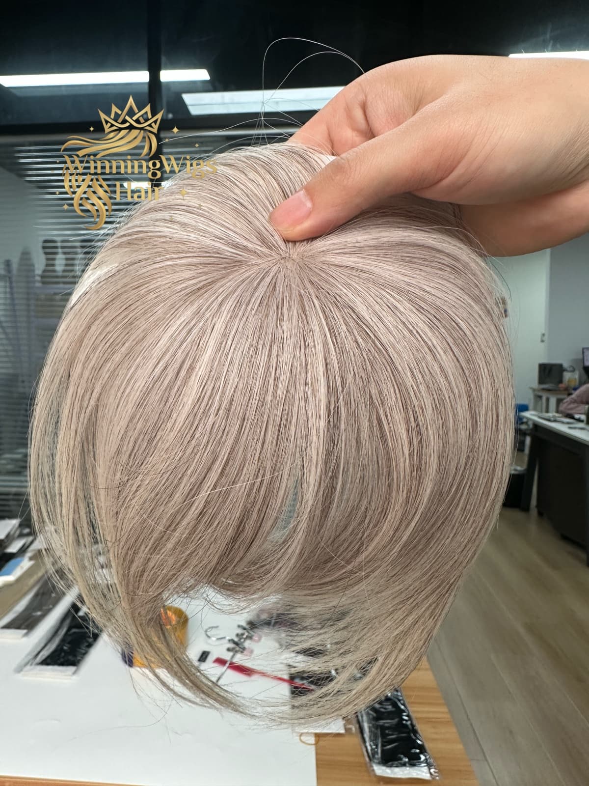 Silver grey mono topper crown detail showing natural-looking hair distribution