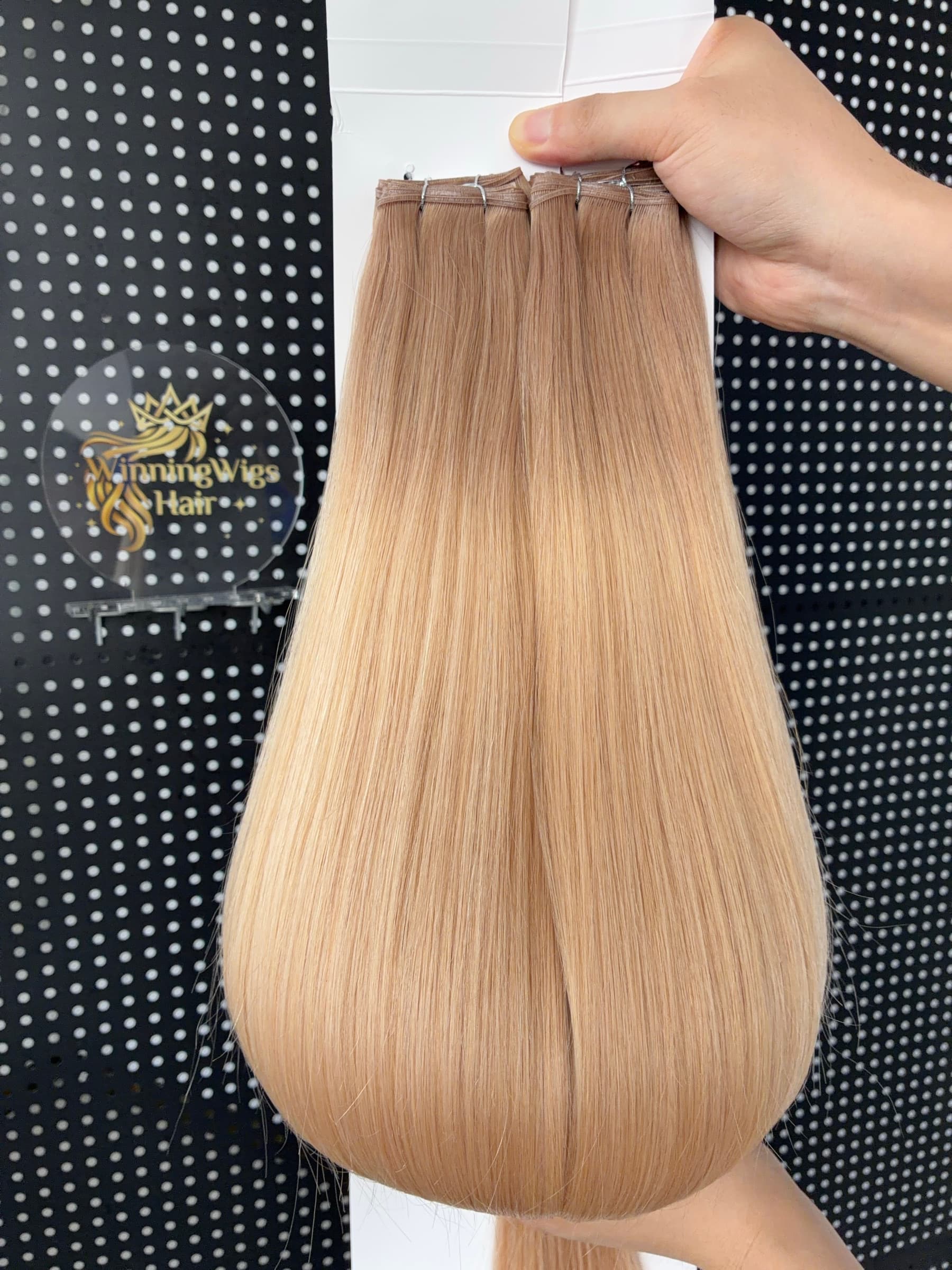 Blonde Genius Weft human hair extension bundles with slim sewn seams