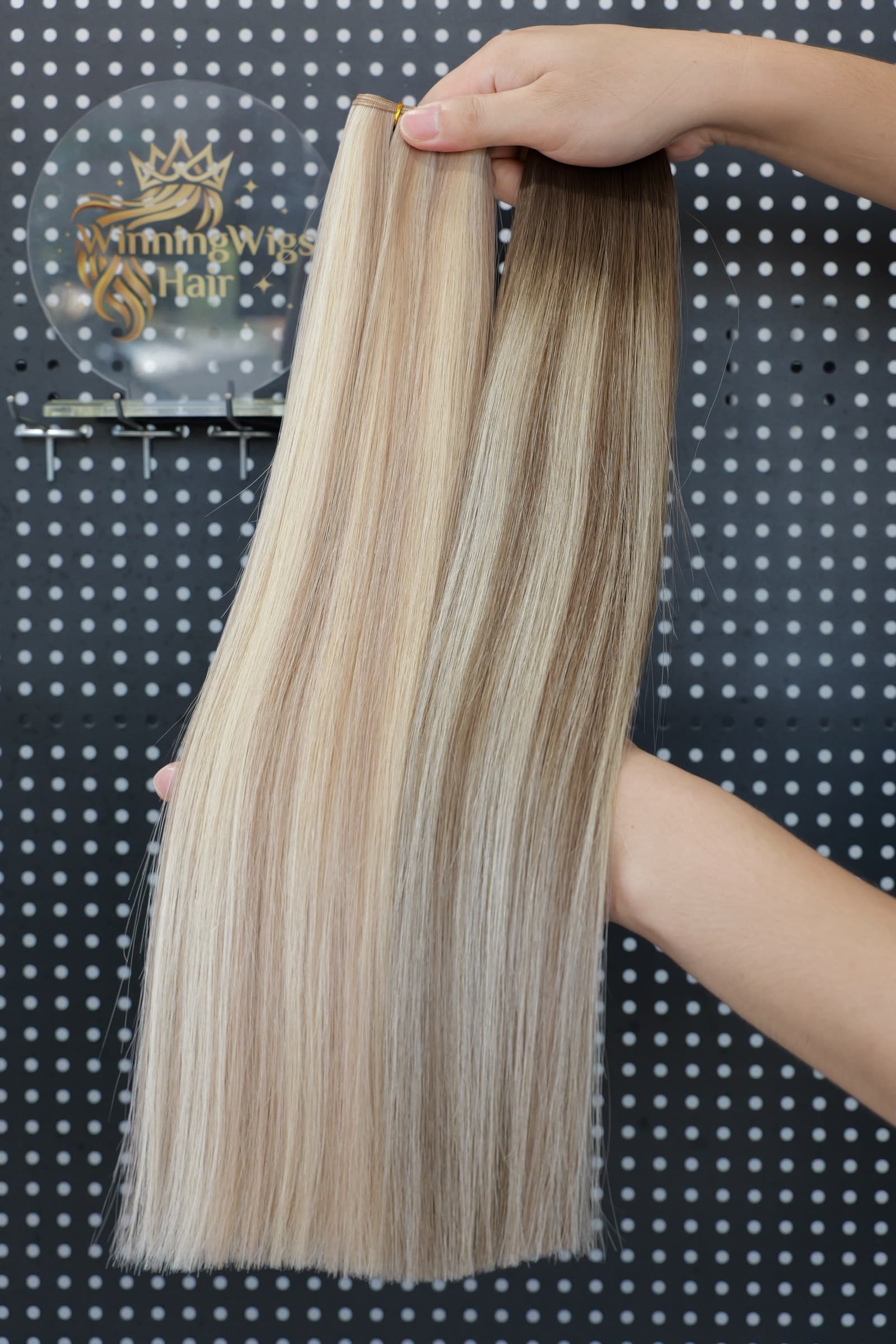 Straight Genius Weft human hair extensions in blonde and ash-brown shades