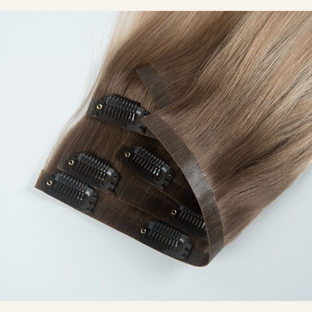 PU Clip-In human hair extension showing flexible polyurethane backing and secure pressure clips