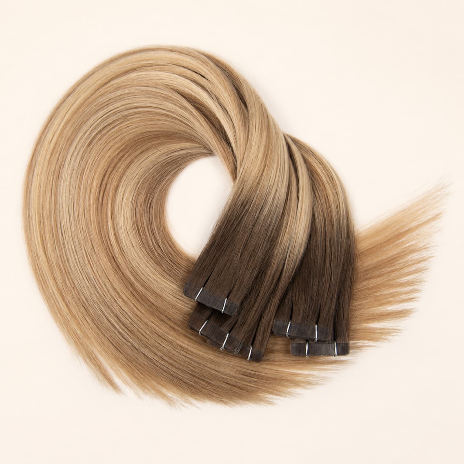 Dark brown Regular Tape-In virgin human hair extensions with visible adhesive tabs