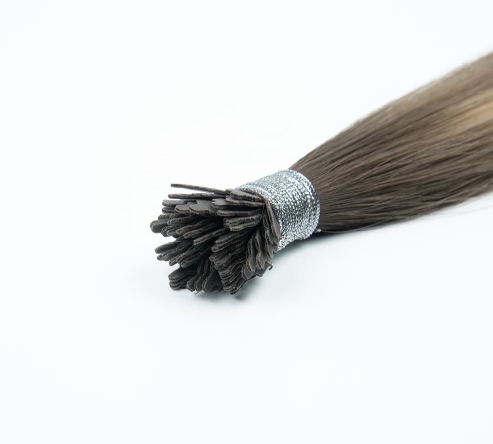 Close-up of dark brown Y Tip human hair extension flat keratin bonds